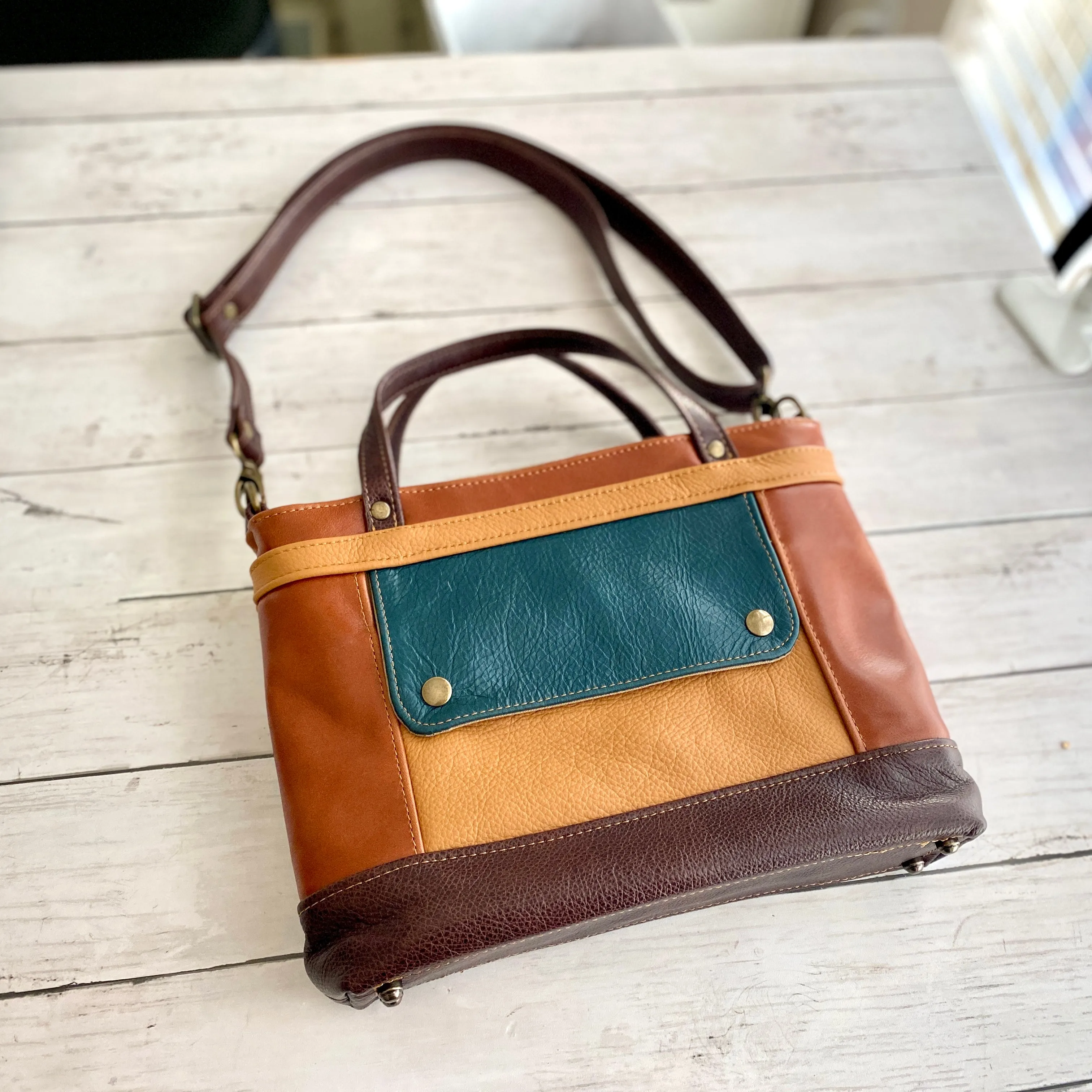 Archive Micro in Cognac, Dark Roast, Camel, Dark Teal