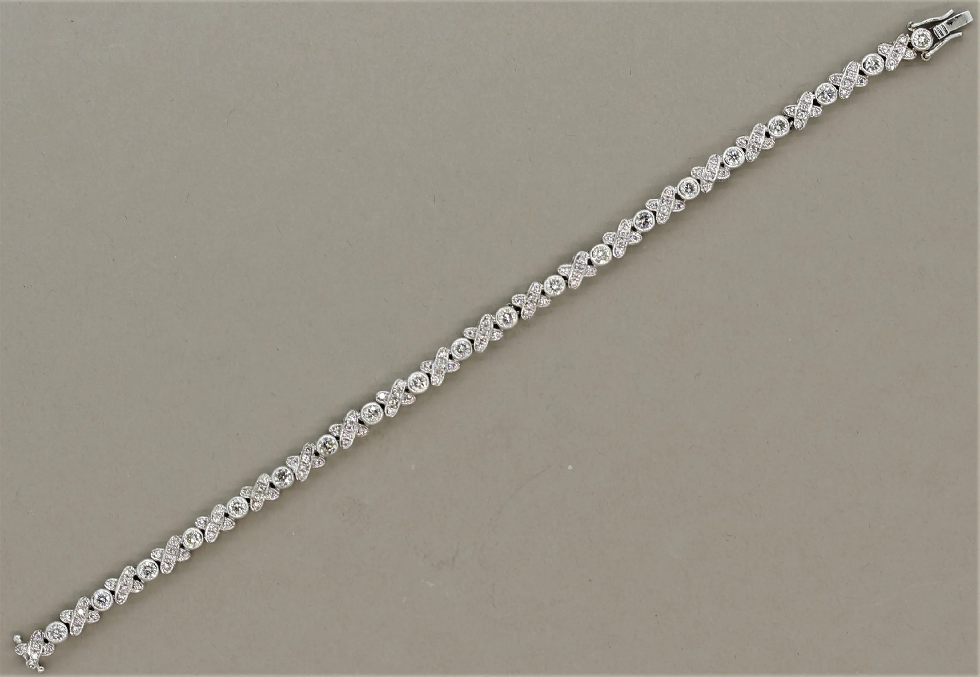 Diamond “XO” Gold Tennis Bracelet