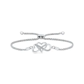 KATARINA Heart Shaped Infinity Diamond Tennis Bracelet in 10K White Gold JK I1-I2 (1/20 cttw)
